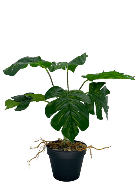 Monstera artificielle détaillée avec feuilles percées, idéale pour décoration intérieure.