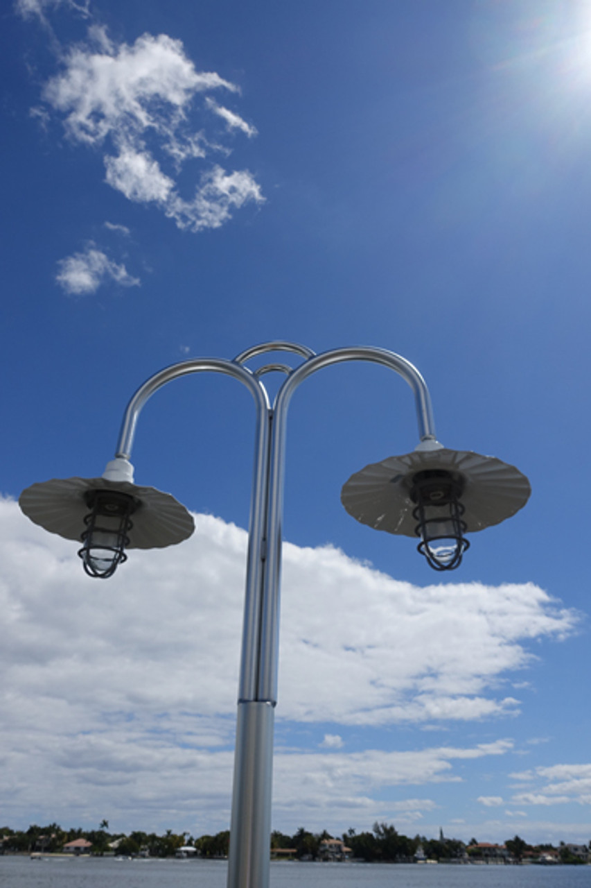 Radial wave shades on custom dual ornate wharf pole light