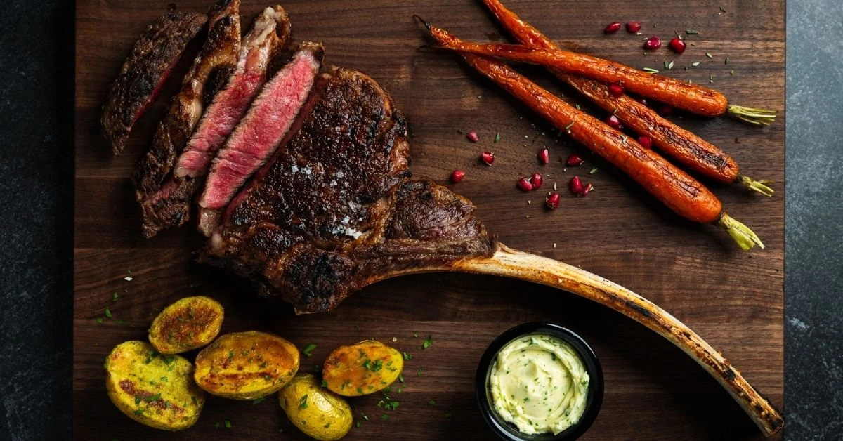 Linz Shop Ribs Tomahawk vs. Cowgirl Bone-In Ribeye: Key Differences - The Linz Shop