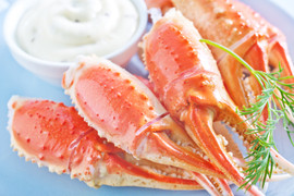 Pictured are Snow crab claws with dipping sauce