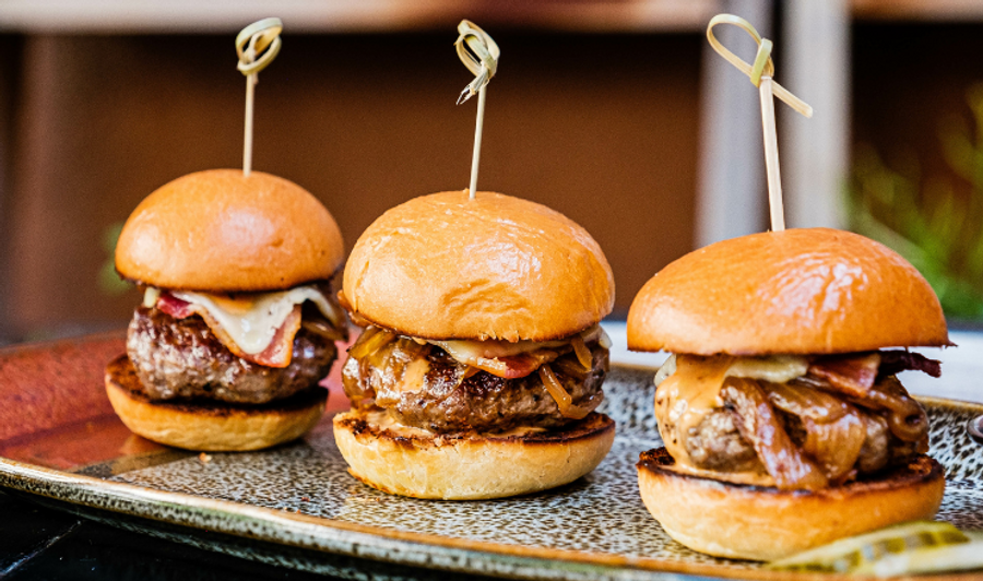 Image of 3 Linz Heritage Angus sliders on brioche rolls with bacon and cheddar cheese