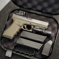 Custom Glock 17 Gen 3 MOS OD Green with Holosun EPS, Radian Guardian, ZEV barrel, SureFire X300 Ultra, factory case, and accessories.