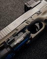 Custom Glock 17 Gen 3 MOS OD Green with Holosun EPS, Radian Guardian, ZEV barrel, SureFire X300 Ultra, factory case, and accessories.