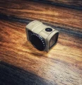 ACRO P2 tool-free billet battery cap with tactile grip and dual O-rings for fast, secure field battery changes on compatible enclosed optics.