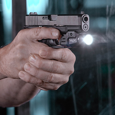 Image of Streamlight TLR-7 HL-X USB 1000 Lumen Black featuring weapon light activation on a Glock handgun