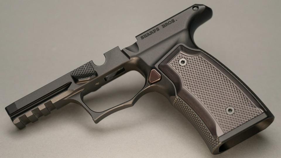 Sharps Bros grip module for the Sig P365 XMacro. G2 model includes steel lug insert.  

Machined from billet 7075-T6 Aluminum.  Mil-Spec black anodized finish.  Black anodized aluminum grip panels.