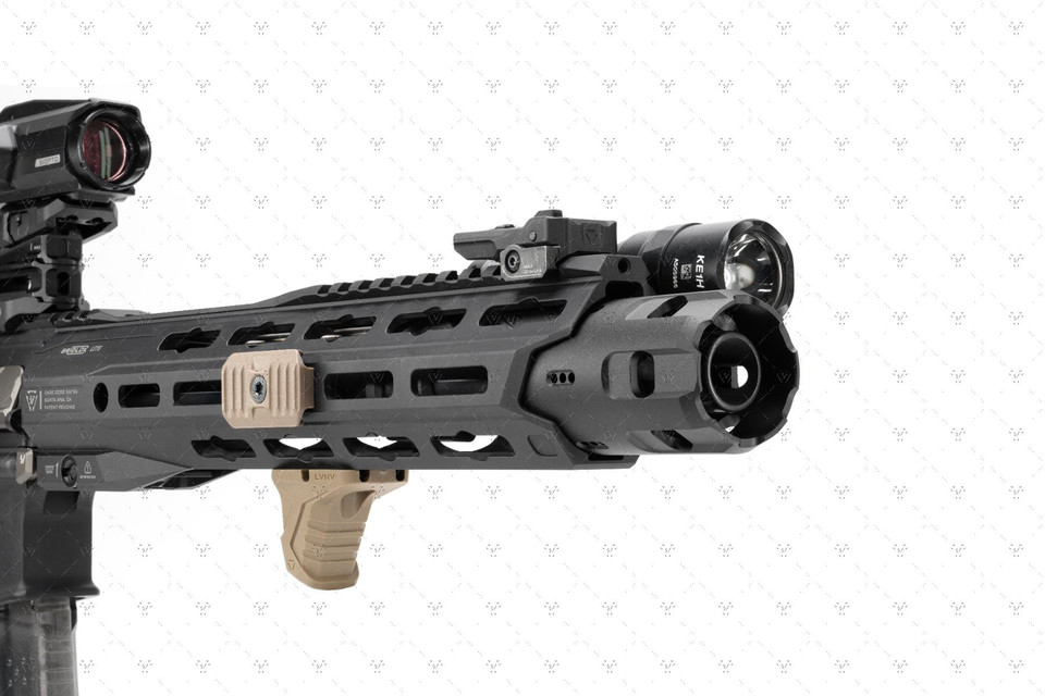 Strike Oppressor Lite V2 — 5.0 oz concussion reduction device with hardened steel core, aluminum shell, 18 vent holes, and fast QD mount for SREM-compatible muzzle devices. Lightweight, quick-attach blast redirector for training and close-quarters use