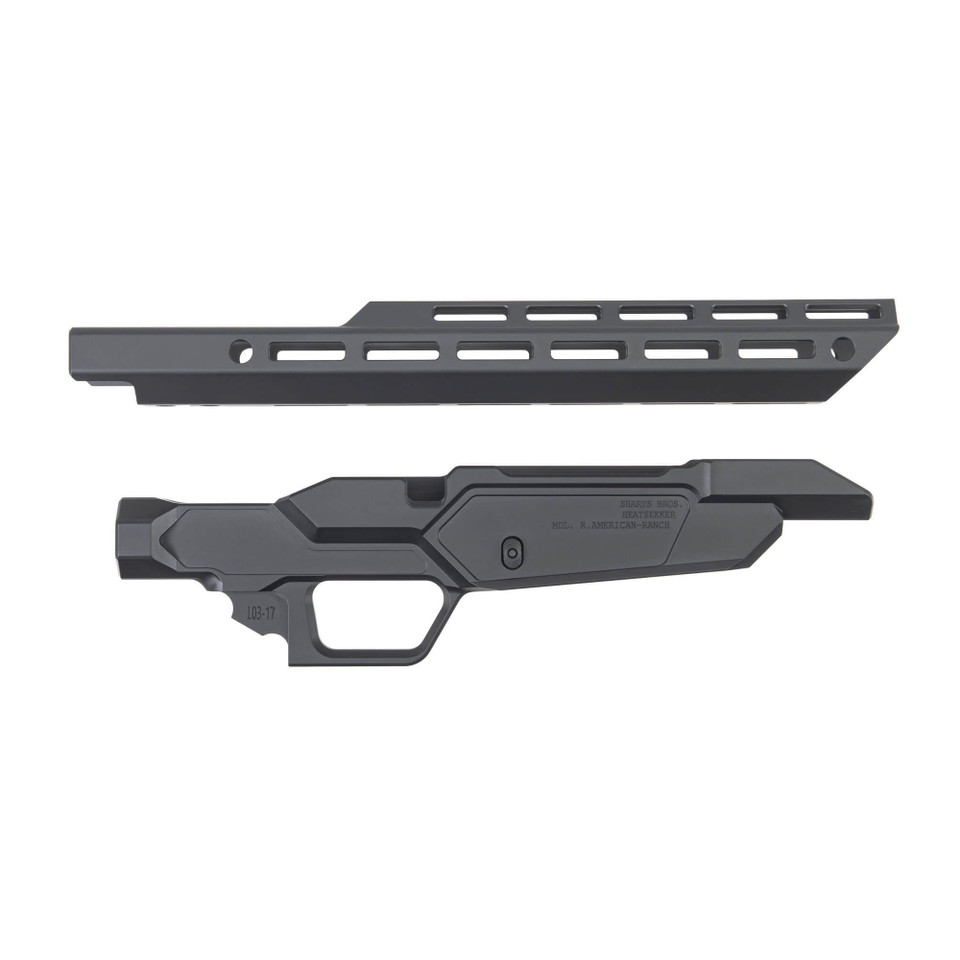 Sharps Bros Heatseeker chassis for Ruger American Ranch rifles using AR-15 magazines, black Cerakote aluminum with 14-inch handguard.