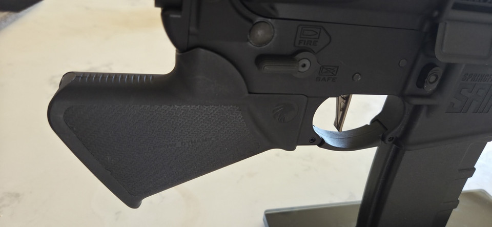 Used Springfield Armory SAINT AR-15 in 5.56 NATO with a California featureless setup, upgraded trigger, M-LOK handguard, and QD-ready stock.