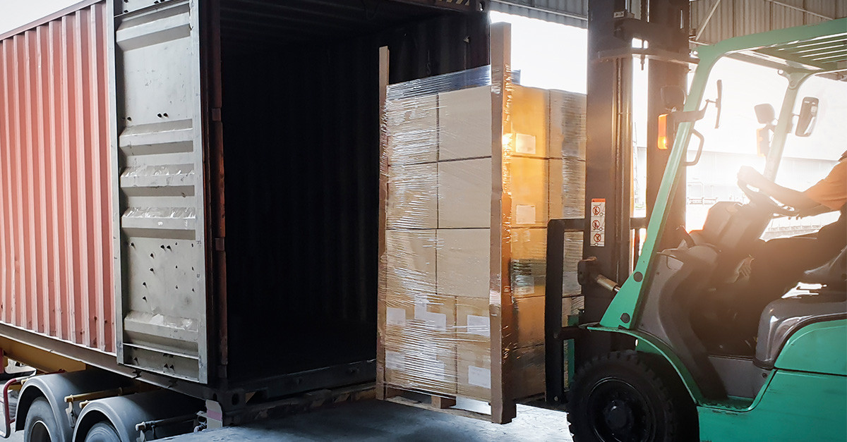 Forklift loading into truck