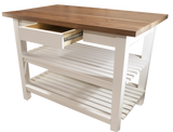 A full architectural view of a custom solid wood butcher block kitchen island, featuring a seamlessly integrated slide-out storage drawer and two painted crossboard lower shelves.