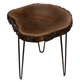 A handcrafted custom round live edge wood end table featuring a unique, natural grain authentic wood slab supported by three sleek black metal V-shaped legs.