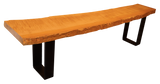 High angle view of a custom-designed live edge wood bench featuring a natural finished slab top and a flat-bottom stainless steel metal base.