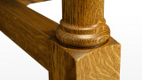 Detail of White Oak Farmhouse Dining Table leg base with laminated white oak turning, block foot, and solid oak cross member