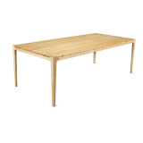 A full wide-angle view of a modern solid maple Parsons dining table by HLC Furniture, showcasing its clean architectural lines, refined edge profile, and spacious ADA-compliant seating clearance.