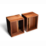 air of solid walnut cube side tables from HLC Furniture with natural live edge slabs, angled view from the left