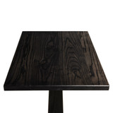 Overhead view of the solid ash tabletop on HLC Furniture Monument dining table, showing cathedral grain through ebony stain