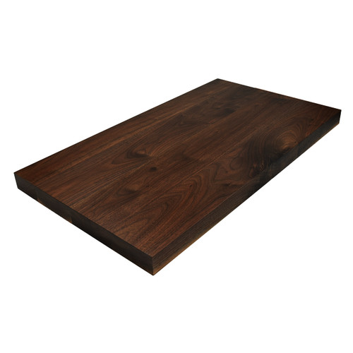 Solid Premium Walnut wide-plank surface manufactured to showcase the wood's natural cathedral grain, providing a warm and prestigious focal point for modern home and office interiors.