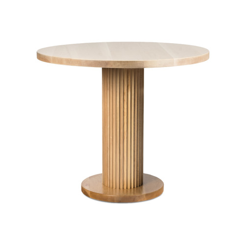A beautiful modern dining table in a low wide angle shot. The soft lighting highlights the clean design and smooth curves of the piece crafted from solid maple.