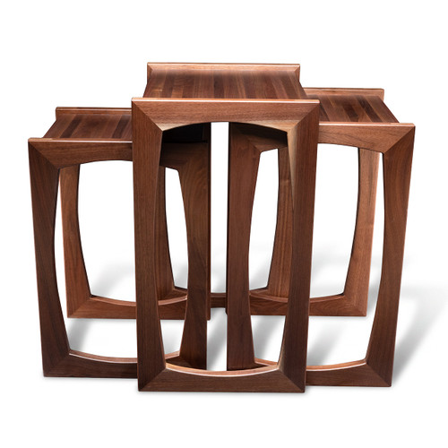Modern walnut nesting tables nested together with butcher block tops, mitered solid walnut legs, and maple spline joinery