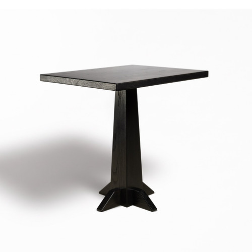 Low angle view of HLC Furniture Monument pedestal dining table showing tapered laminated column and four-foot base