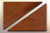 Leopardwood Winder Treads diagonally cut into two pieces.