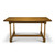 Long side view of White Oak Farmhouse Dining Table with traditional turned legs, solid oak cross members, and warm farmhouse finish