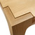 A precise close-up of the table's corner construction, featuring the exposed lock miter joinery where the gently rounded solid maple leg integrates seamlessly with the milled tabletop perimeter.