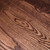 Close-up of Signature Parsons Dining Table cathedral ash grain highlighting natural wood movement, premium hardwood character, and smooth finish