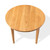 Front overhead view of the Cascade Round Dining Table with round hardwood top, softened edge, and elegantly sculpted solid wood legs