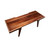 Long angled view of solid walnut modern coffee table with floating inset top, walnut frame, maple accent layer, and minimalist design
