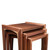 Tight detail of modern walnut nesting tables showing layered nesting configuration, mitered walnut legs, and handcrafted joinery