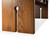 Low angled view of the white oak keyhole bench showing the grain of the seat and the keyhole cutouts in both legs
