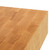 Macro detail of the end grain hickory corner, showing the natural wood grain, tight growth rings, and durable structure designed to protect knife edges.