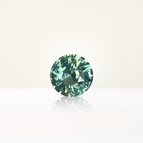 1.26 ct Round Teal Sapphire - Nolan and Vada