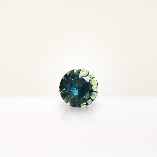 0.59 ct Round Teal Sapphire - Nolan and Vada 0.59 ct Round Teal Sapphire - Nolan and Vada