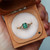 Trinity - 0.98 Emerald Cut Emerald Engagement Ring - [S814-TRINITYR-NVSTE2148]