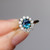 Alexandra - 1.05ct Oval Teal Sapphire 18K Yellow Gold - NVST3075
