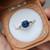 Faye - 1.95ct Round Blue Sapphire Engagement Ring - 18K Yellow Gold [S811-FAYEM-NVST3215]