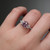 S819-FLORA-WG-NVSTL3514 - Ring on Hand