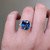 S823-FLEUR-WG-NVSTL3650 - Ring on Hand