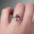 S826-CELINE-WG-NVSTL3666 - Ring on Hand