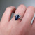 S818-IRIS-WG-NVSTL3660 - Ring on Hand
