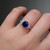 S819-FLORA-WG-NVSTL3697 - Ring on Hand