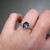 S817-CLARA-WG-NVST3736 - Ring on Hand