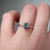 S826-CELINE-WG-NVSTL3711 - Ring on Hand