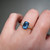 S817-CLARA-YG-NVST3723 - Ring on Hand