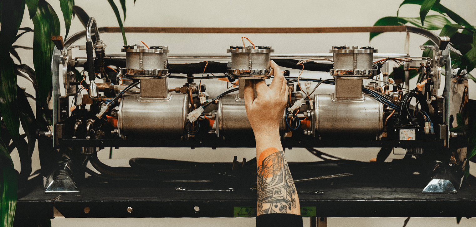 Espresso Technician Working On a Slayer Espresso Machine.