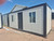 BasePod 10™ Custom Comfort Bundle exterior showing windows, door, and insulated panels, gift voucher included