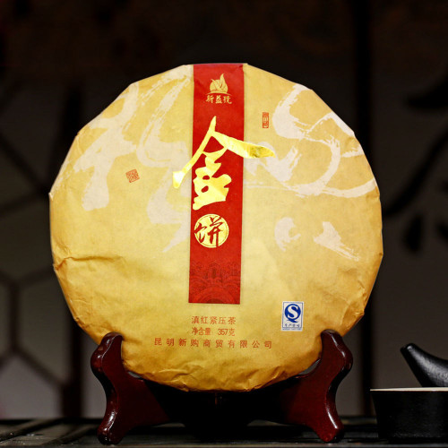 Xin Yi Hao Supreme Golden Needle Dian Hong Tribute Cake Yunnan Black Tea 357g